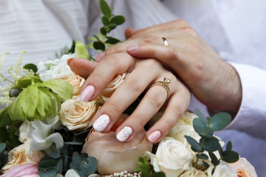 The groom keep the bride for hands
