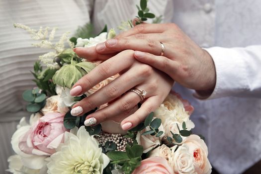 The groom keep the bride for hands