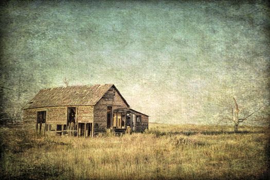 old abandoned homestead on eastern Colorado prairie, grunge and gritty texture picture finish