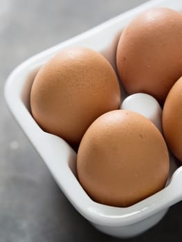 close up of a tray of rustic chicken egg