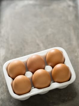 close up of a tray of rustic chicken egg