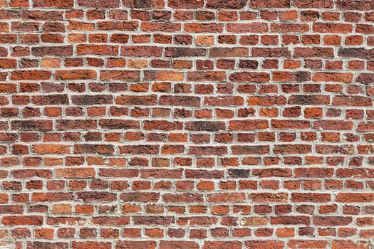 Background of old vintage orange brick wall.