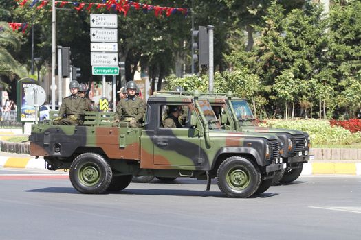 ISTANBUL, TURKEY - AUGUST 30, 2015: Soldiers in vehicles during 93th anniversary of 30 August Turkish Victory Day parade on Vatan Avenue