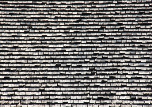 Wooden black and silver tile roof background