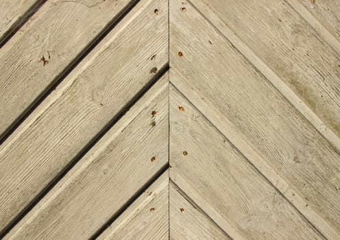 Handcrafted door plank lines with nails forming angle