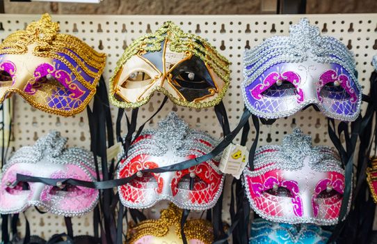 VENICE - NOVEMBER 20: Masquerade Venetian masks  on sale on November 20, 2015 in Venice, Italy. The annual Carnival of Venice is world-famed for its elaborate masks.