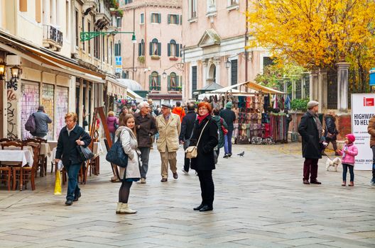 VENICE - NOVEMBER 20: Crowded with tourists Nuova street on November 20, 2015 in Venice, Italy. Venice is the capital of the Veneto region sited on a group of 118 small islands.