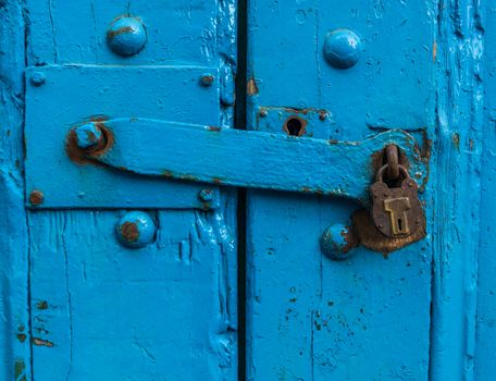 Vintage Sturdy Blue Wooden Door With Heavy Metal Lock