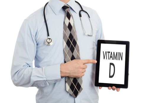 Doctor, isolated on white backgroun,  holding digital tablet - Vitamin D