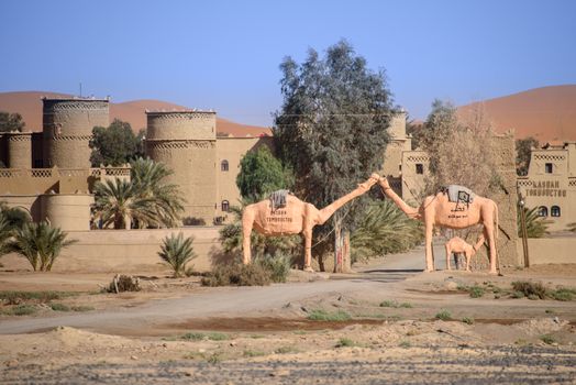 Hassilabied, Morocco - January 20th, 2016: Kasbah Tombouctou with famous camels statue. Kasbah is a luxury hotel in Hassilabied