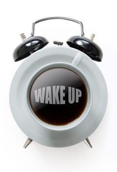 Alarm clock with wake up coffee in the middle
