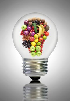 Fruit and vegetable ingredients inside a light bulb in the shape of a human head
