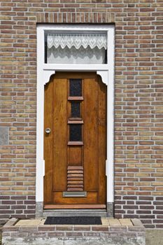 Wooden door part of a home, Netherlands, Europe