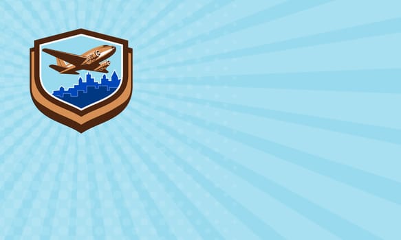 Business card showing illustration of a vintage passenger DC10 airplane take off with cityscape buildings in background set inside crest shield done in retro style. 
