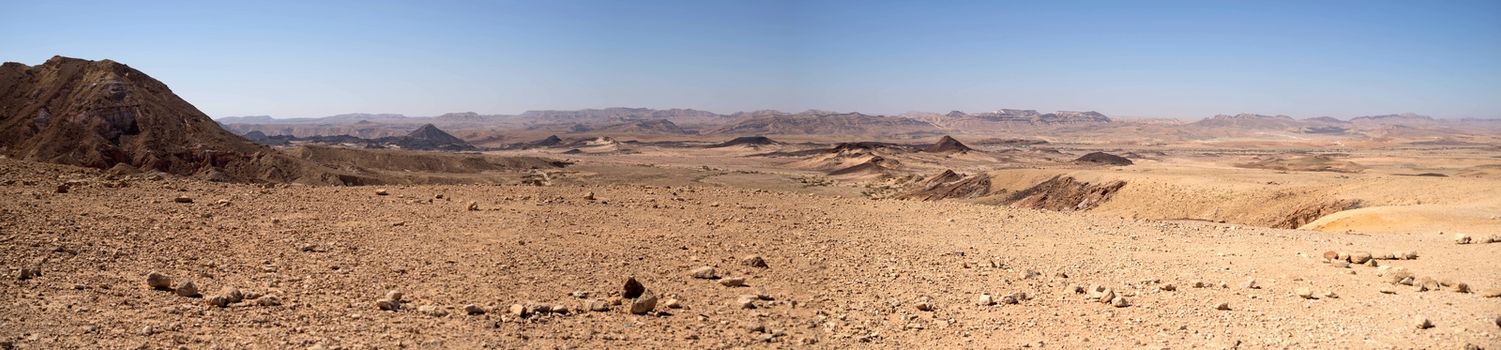 Hiking in stone desert mountain landscape of Israel