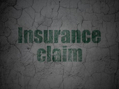 Insurance concept: Green Insurance Claim on grunge textured concrete wall background