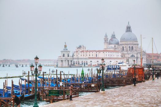 VENICE - NOVEMBER 20: Di Santa Maria della Salute as seen from San Marco square on November 20, 2015 in Venice, Italy. It's the principal public square of Venice, where it is generally known just as the Piazza.