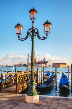 Gondolas floating in the Grand Canal on a sunny day