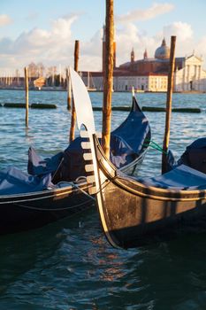 Gondolas floating in the Grand Canal on a sunny day