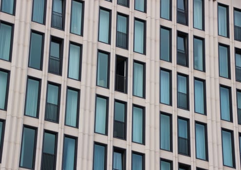 Perspective of building facade with one open window