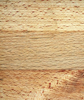 Closeup of wood brown texture with grainy structure.