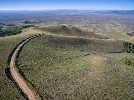 windy back country road aerial view - Independence Mountain Road in North Park, Colorado - aerial view towards Walden and North Platte RIver valley