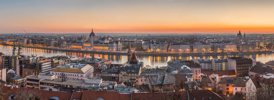 Wide Panorama of Budapest with Hungarian Parliament and Danube River at Dusk