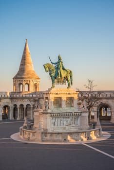 Saint Stefan Statue at Fisherman's Bastion, in Budapest, Hungary with Clear Blue Sky in Background at Sunrise