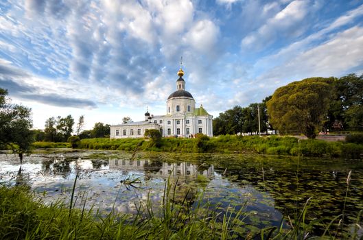 View of the ancient temple in Vyazma, Russia. Standing at the pond.