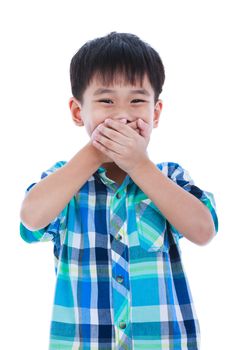 Playful asian boy covering his mouth. Isolated on white background. Positive human emotion, facial expression feeling reaction. Studio shot.
