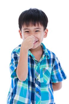 Playful asian boy covering his nose. Isolated on white background. Positive human emotion, facial expression feeling reaction. Studio shot.