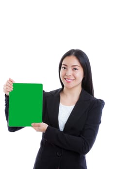Happy asian businesswoman holding green blank paper sheet and looking at camera. Isolated on white background. Positive human emotion. Studio shot.