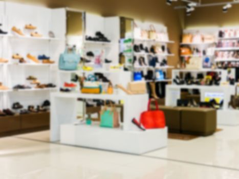 Blur image of shoes and accessories store as background