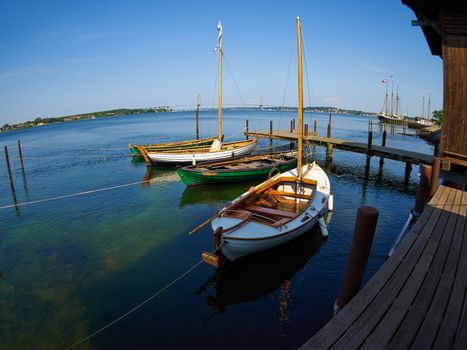 Old vintage traditional Danish wooden sail boat in Middelfart Marina Denmark