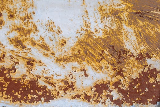 rusty iron surface covered with old chipped grey color paint, which has long been influenced by different climatic conditions