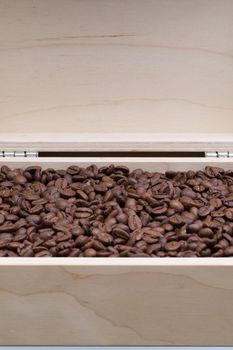 Coffee beans in an open wooden box