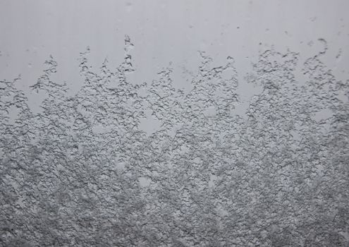 Melting cold Snow Background From Inside of Window