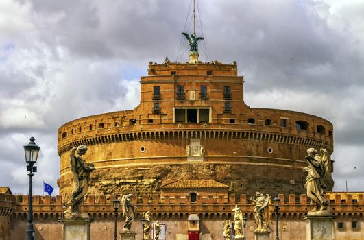 Castel Sant'Angelo or Mausoleum of Hadrian and statues on the bridge by day, Rome, Italy