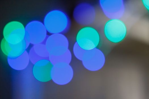 Blue bokeh light, shimmering blur spot lights on abstract background