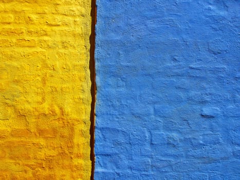 Bright colors blue and yellow wall grunge style