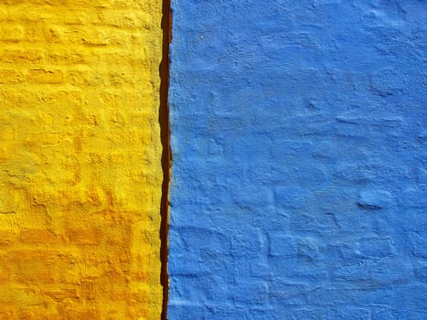 Bright colors blue and yellow wall grunge style