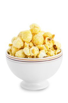 Popcorn in white bowl isolated on white background, Save clipping path.