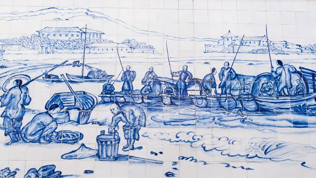 Macau - March 14, 2016 :  Praia Grande with Fisherman and S. Francisco Church was drew on ceramic wall by George Chinnery in 1837 - Wall art around Cathedral a part of Historic Center in Macau