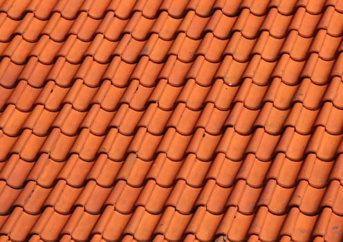 Red Clay Tile Roof on Old Farm House in Obliquely Perspective