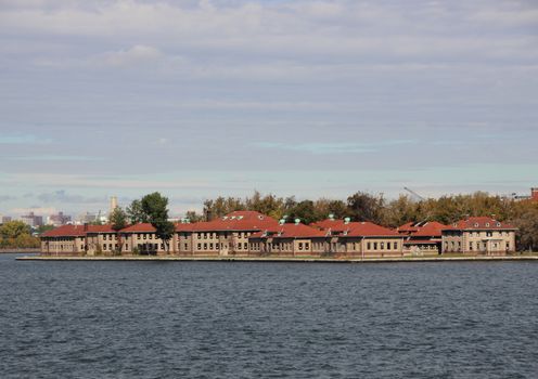 Ellis Island with Red Roof Administration Buildings and Water