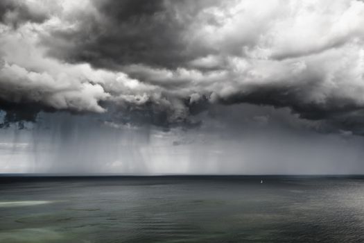Sailboat at Sea during a Thunderstorm