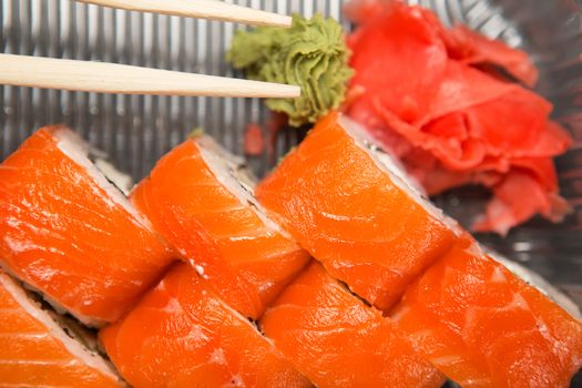 Sushi roll philadelphia. Philadelphia roll in Disposable Plastic Food Container. Business lunch concept