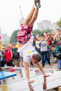 Kharkiv, Ukraine - June 11, 2016: Man performs a trick "Battle Barstylers Workout" on Freedom Square in Kharkov