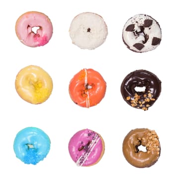 Colorful delicious donuts isolated on white background.