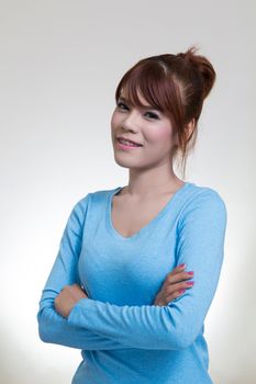 Asian woman crossed arms standing with smiling, Confident pose